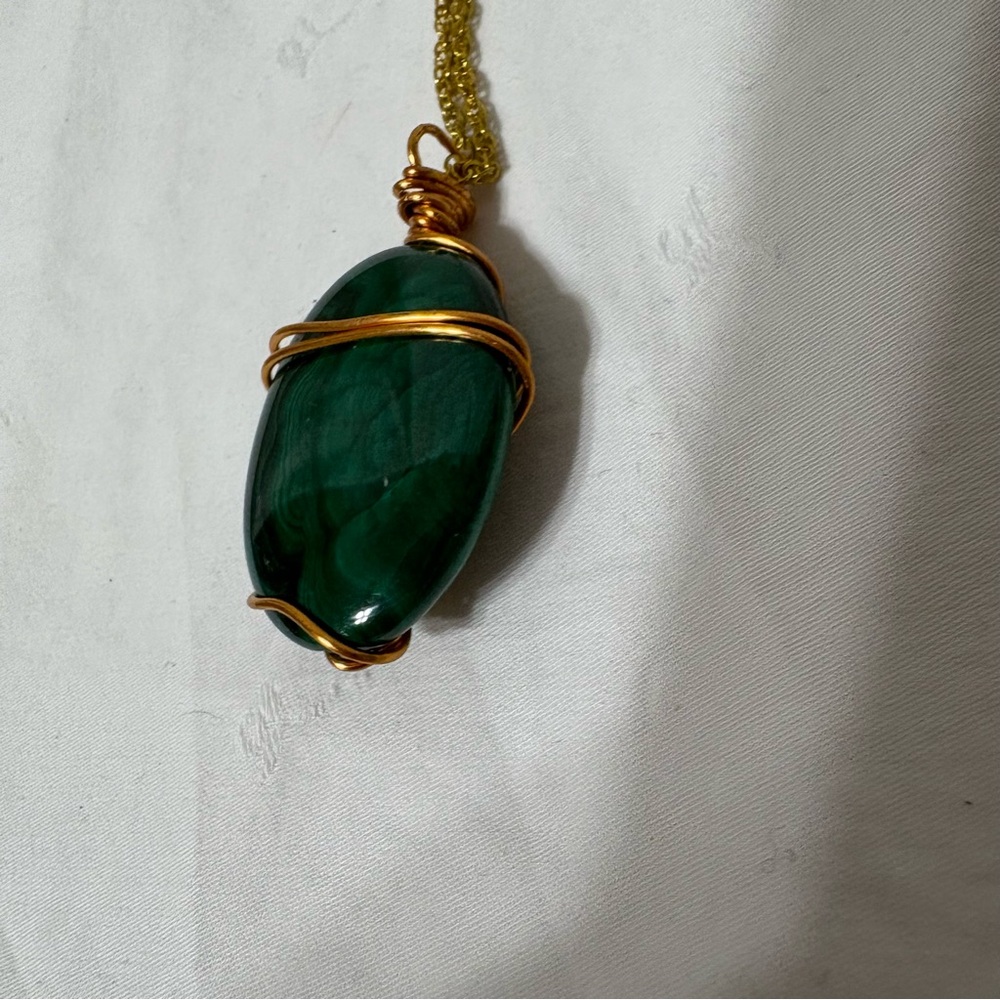 malachite wire-wrapped pendant with a gold-toned chain. - Picture 3 of 6